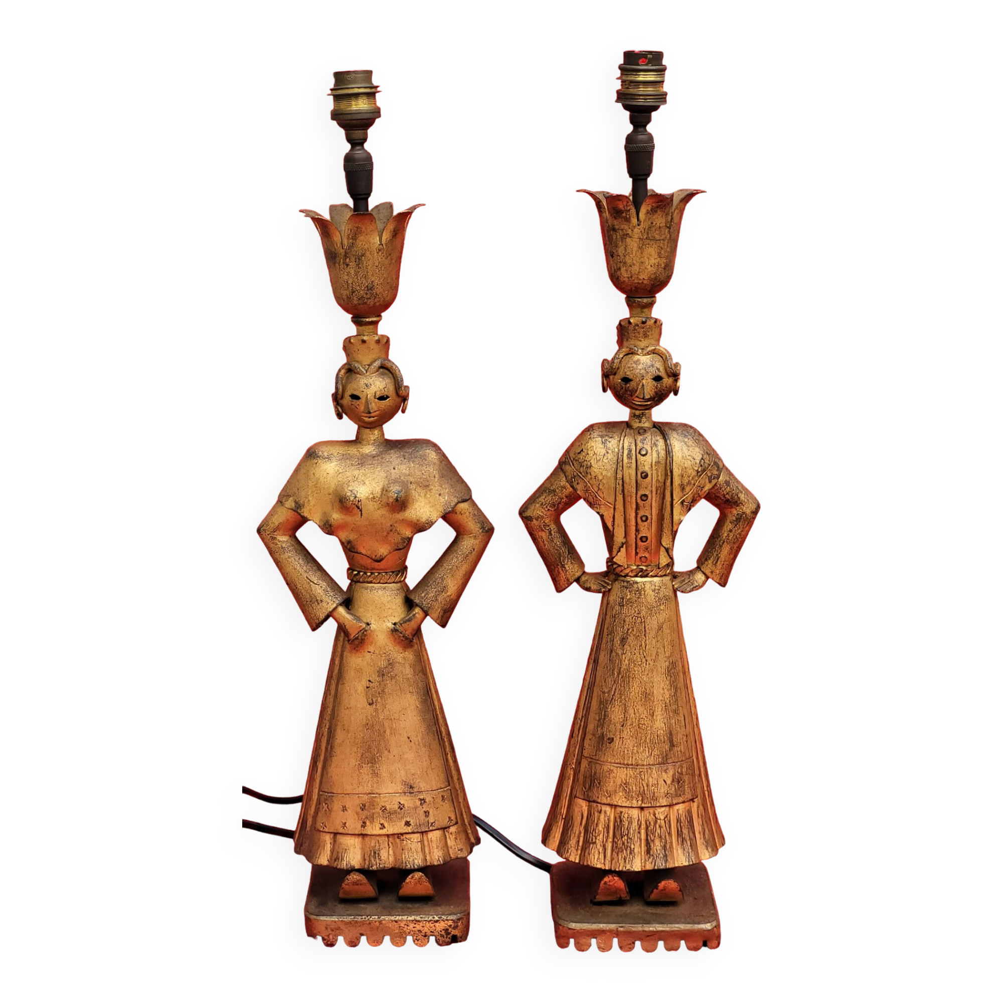 Pair of gilded beaten iron sculpture lamps attributed to Gilbert Poillerat