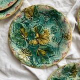 5 plates in vine leaf slip, late 19th century
