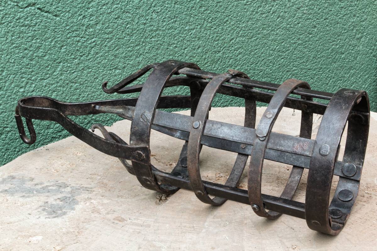 Riveted wrought iron cage suspension