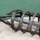 Riveted wrought iron cage suspension