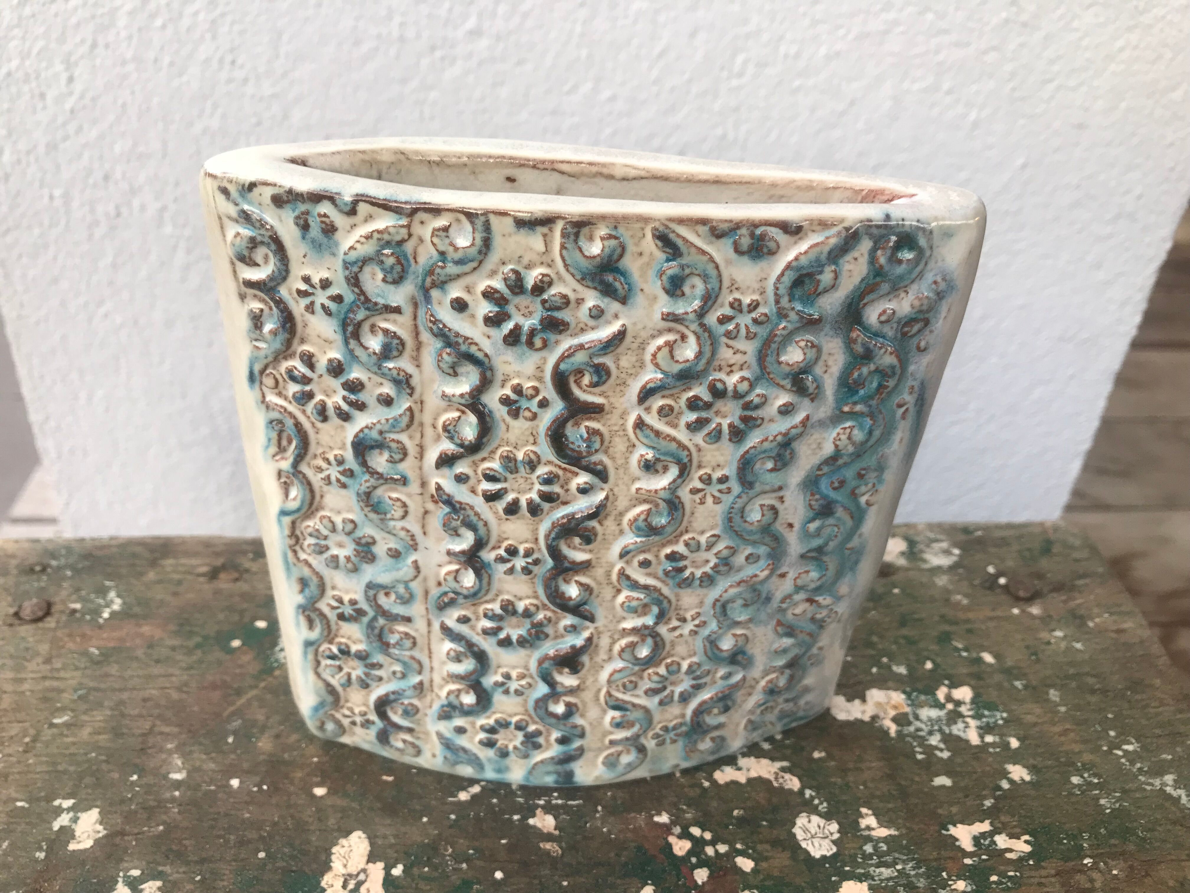 Vintage ceramic vase, decorated relief