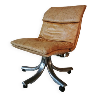 Swivel leather armchair