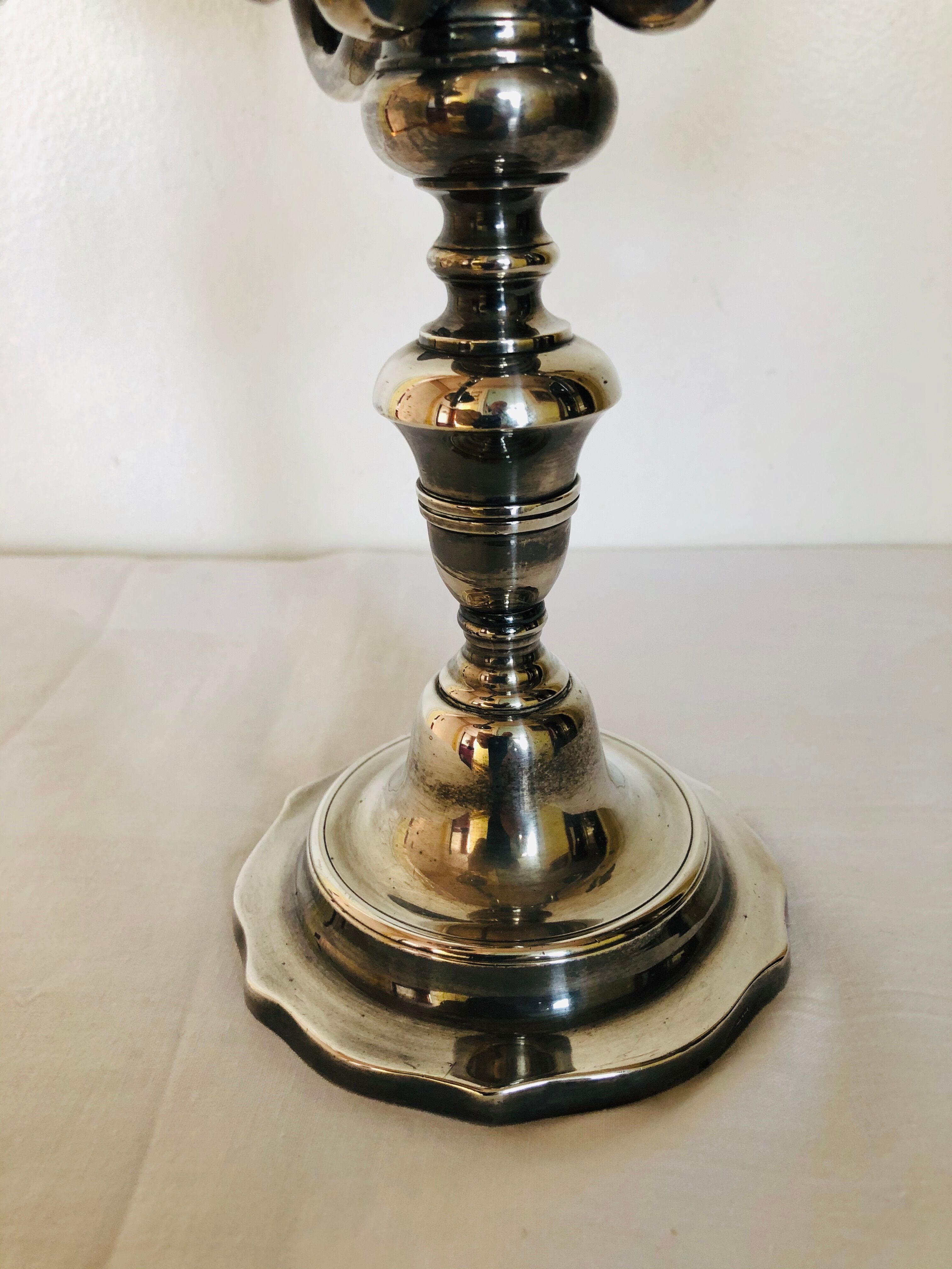 Pair of silver metal candlesticks