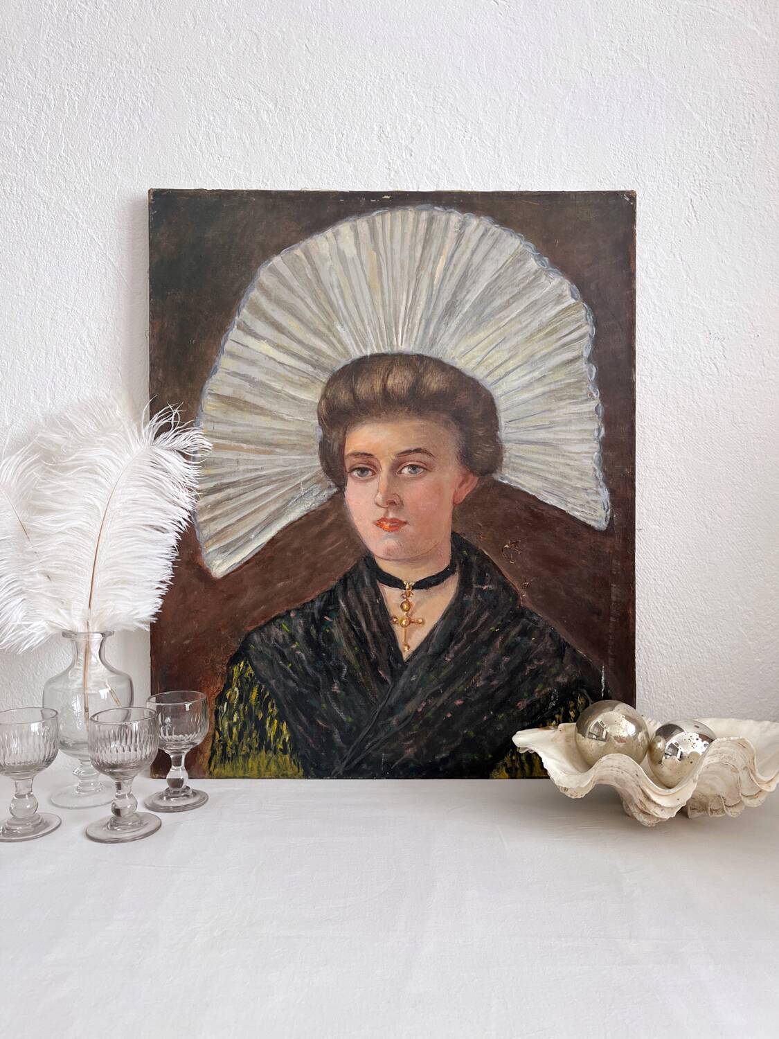 Old oil painting on canvas portrait of a woman in traditional costume