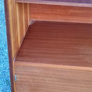 Bookcase from the 60s/70s in golden mahogany with bobbin feet