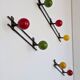 Porte manteau mural boules bois métal noir années 60
