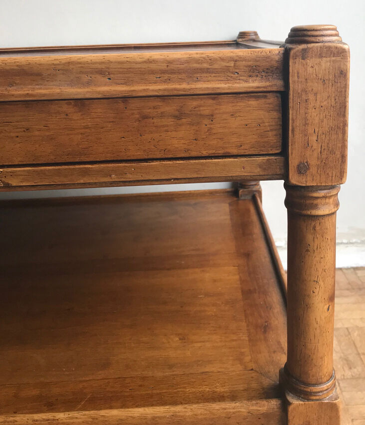 A solid wood-marked coffee table.