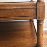 A solid wood-marked coffee table.