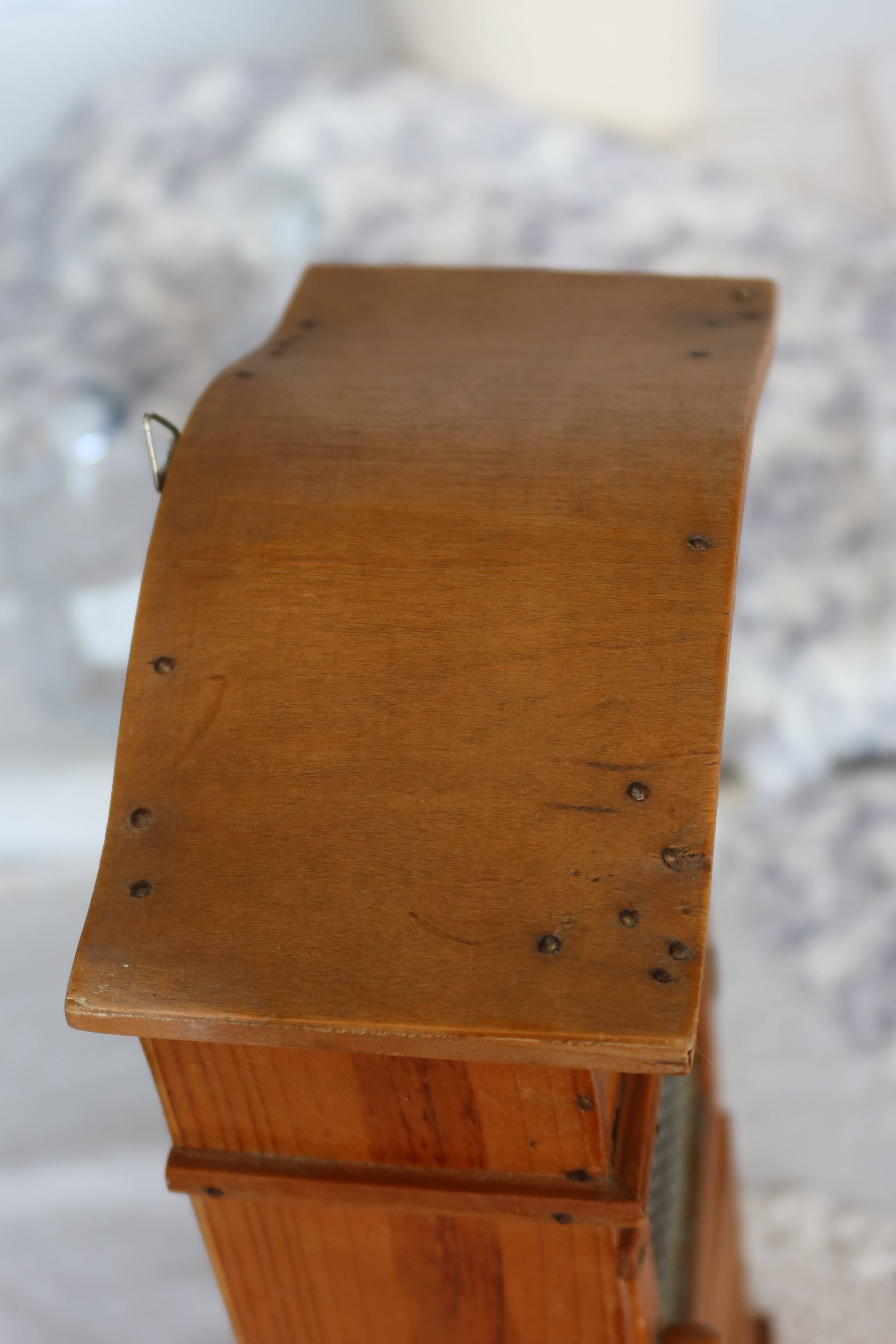 Vintage wooden shelf with drawers and wire mesh door