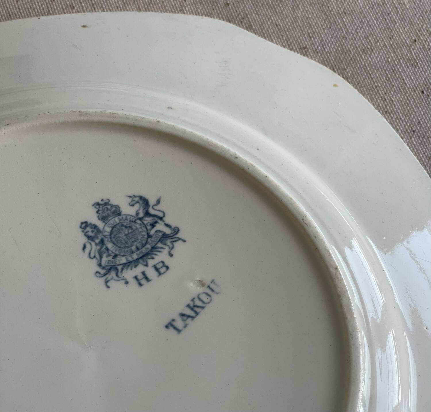 9 mismatched blue ironstone plates