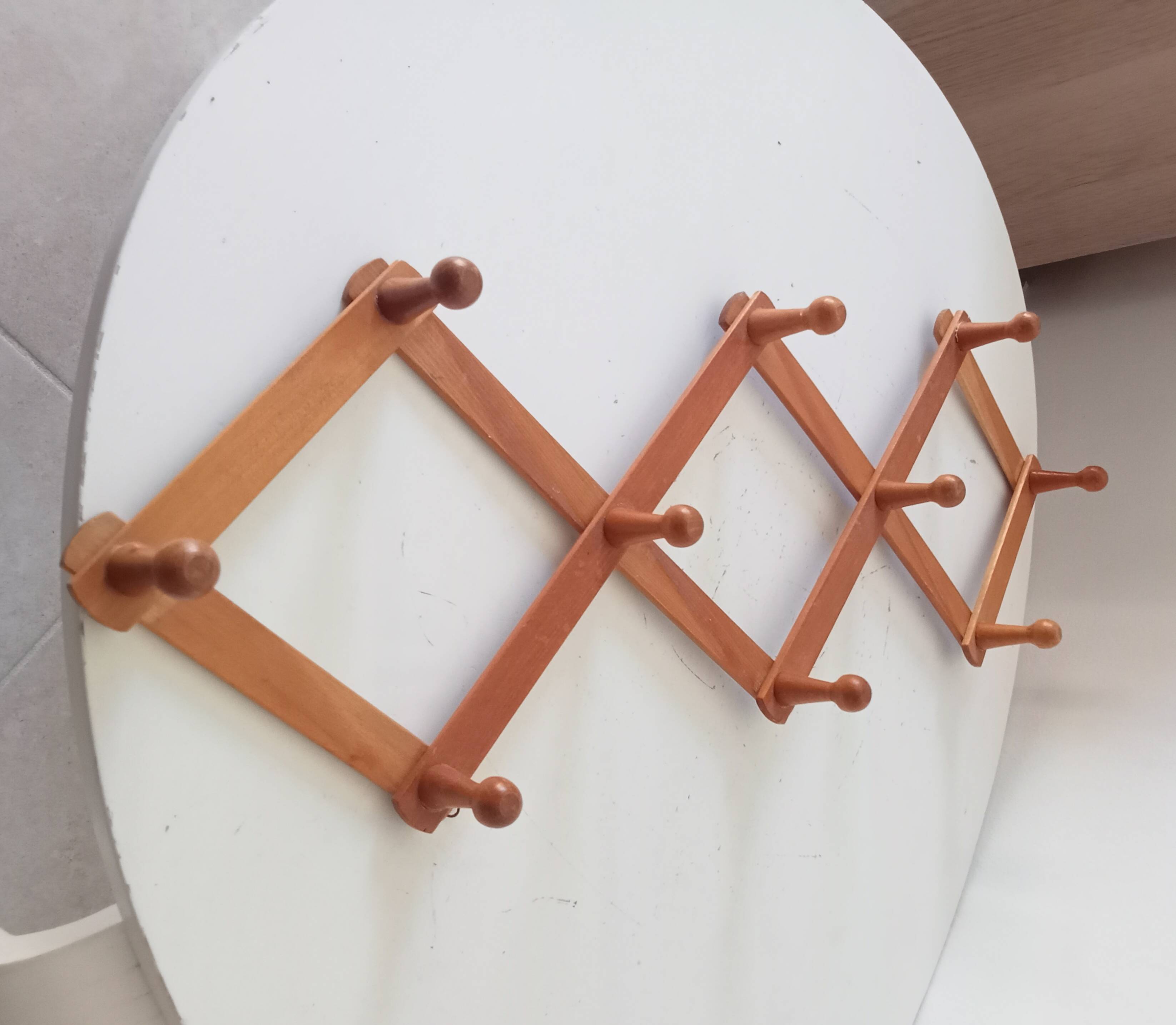 Vintage accordion wall coat rack