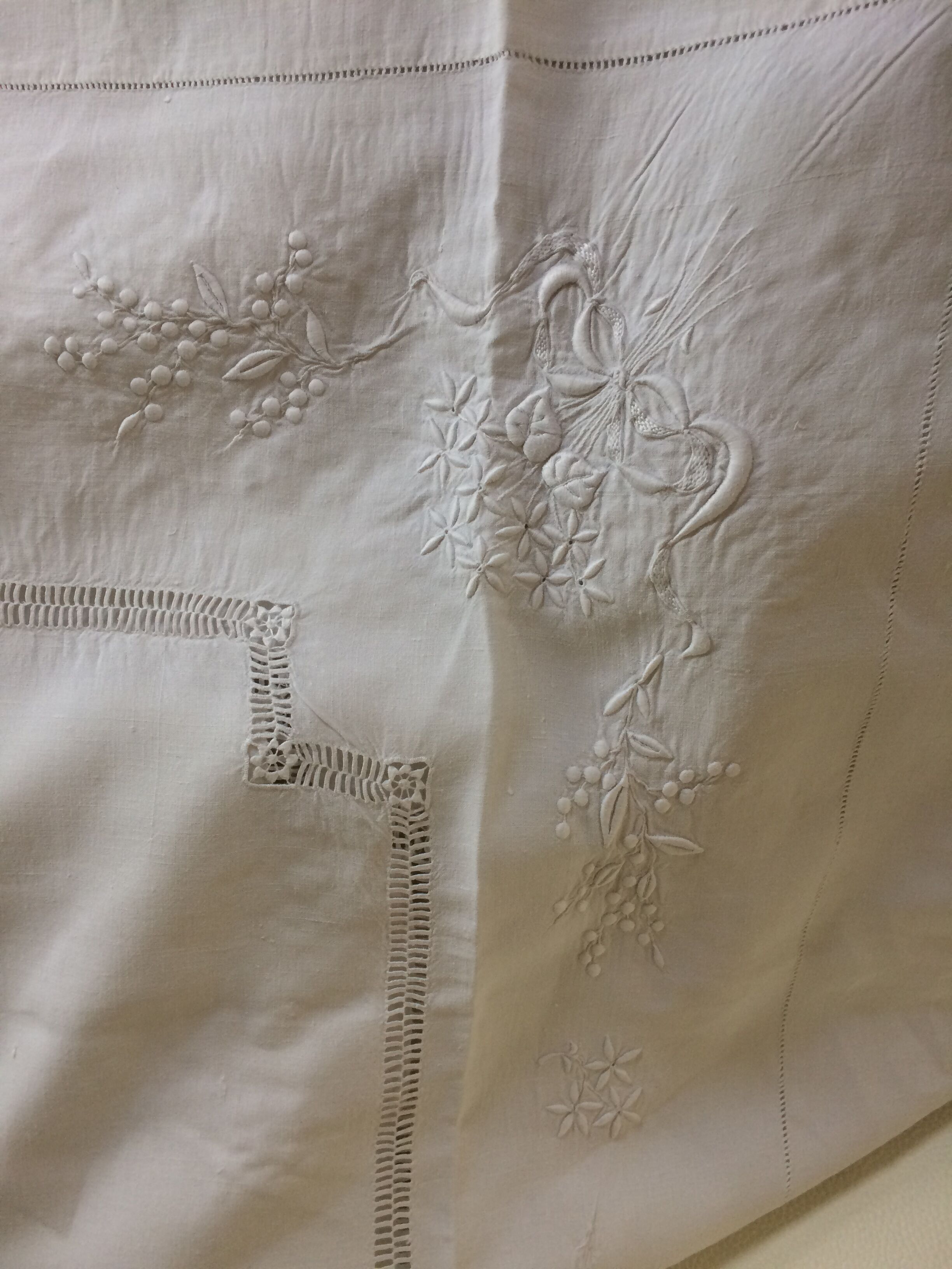 Antique linen sheet with days, embroideries and monograms worked