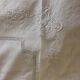 Antique linen sheet with days, embroideries and monograms worked