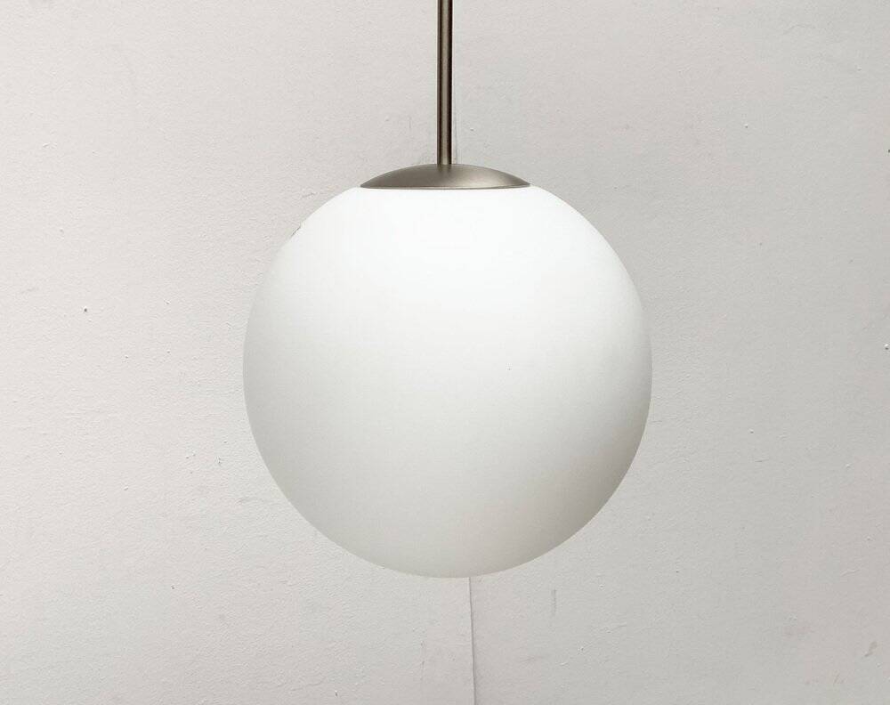 Suspended glass ball lamp by Peill & Putzler.