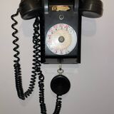 Old Ericsson wall telephone in black bakelite