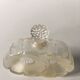 Ensemble de trois bouteilles de parfum Guerlain " Abeilles " avec une bouteille de parfum Lalique