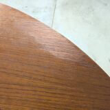 Round extendable wooden dining table