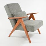 KOMPAS armchairs in grey and white.