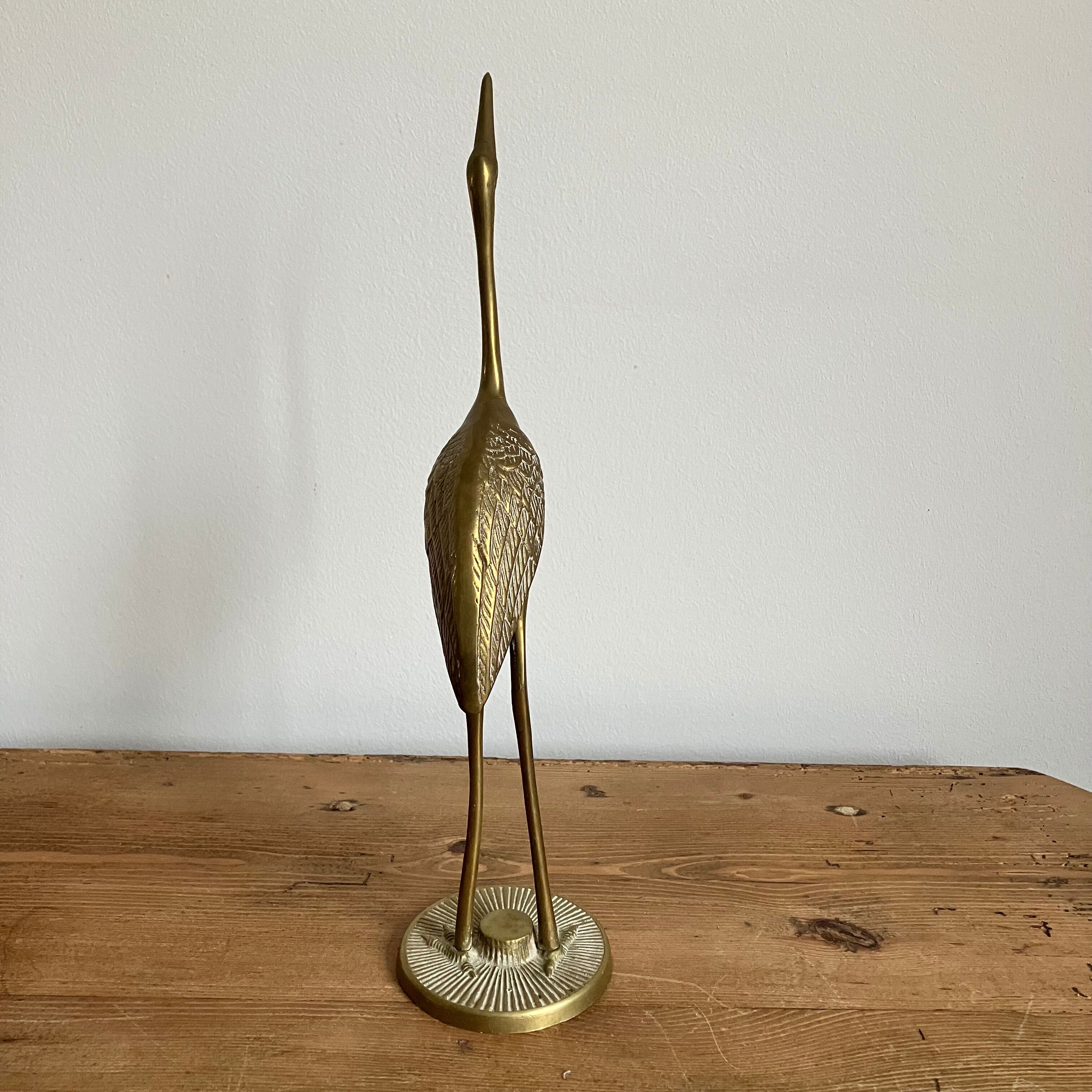 Brass heron