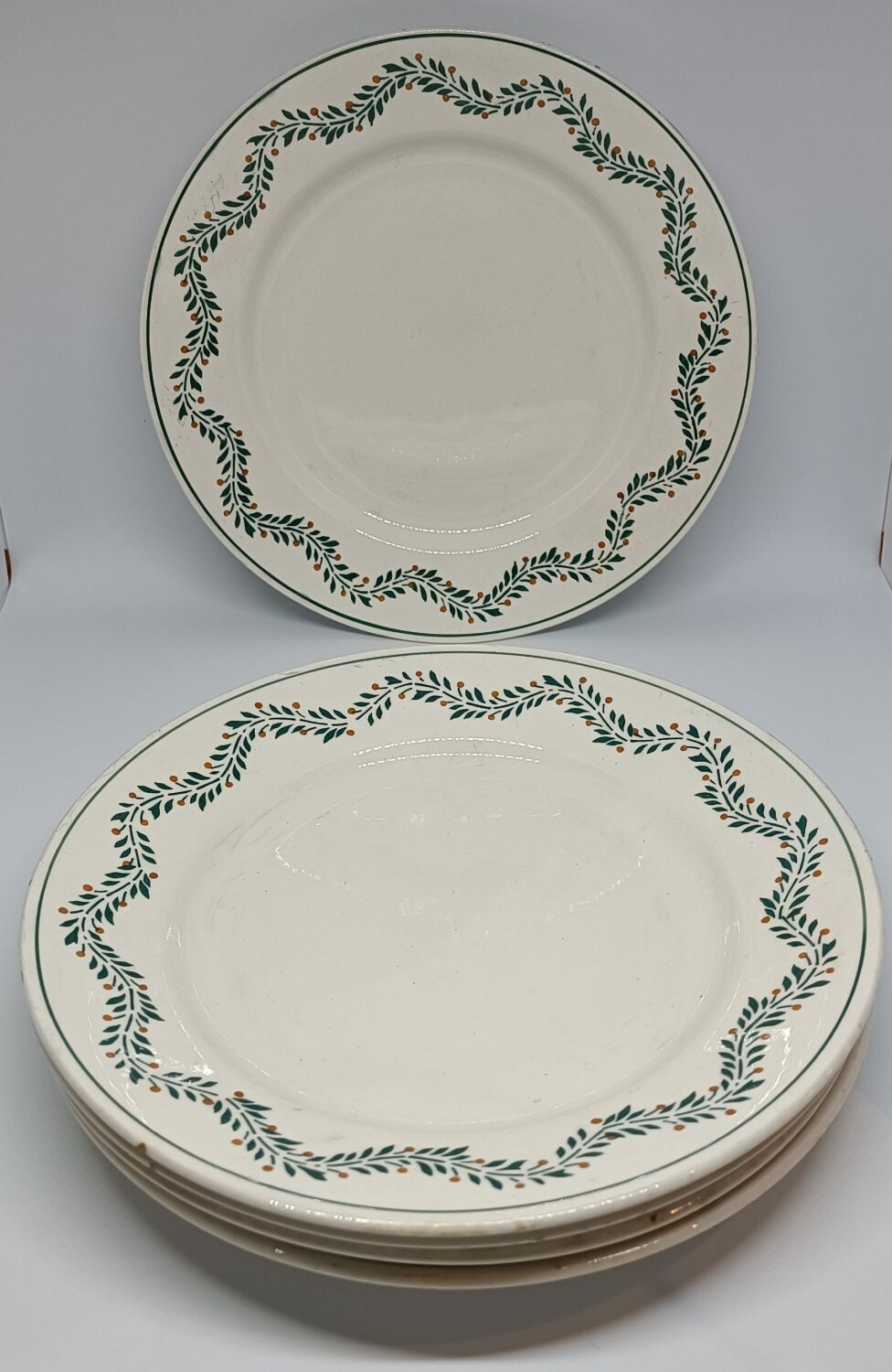 Set of five Longwy iron earth plates