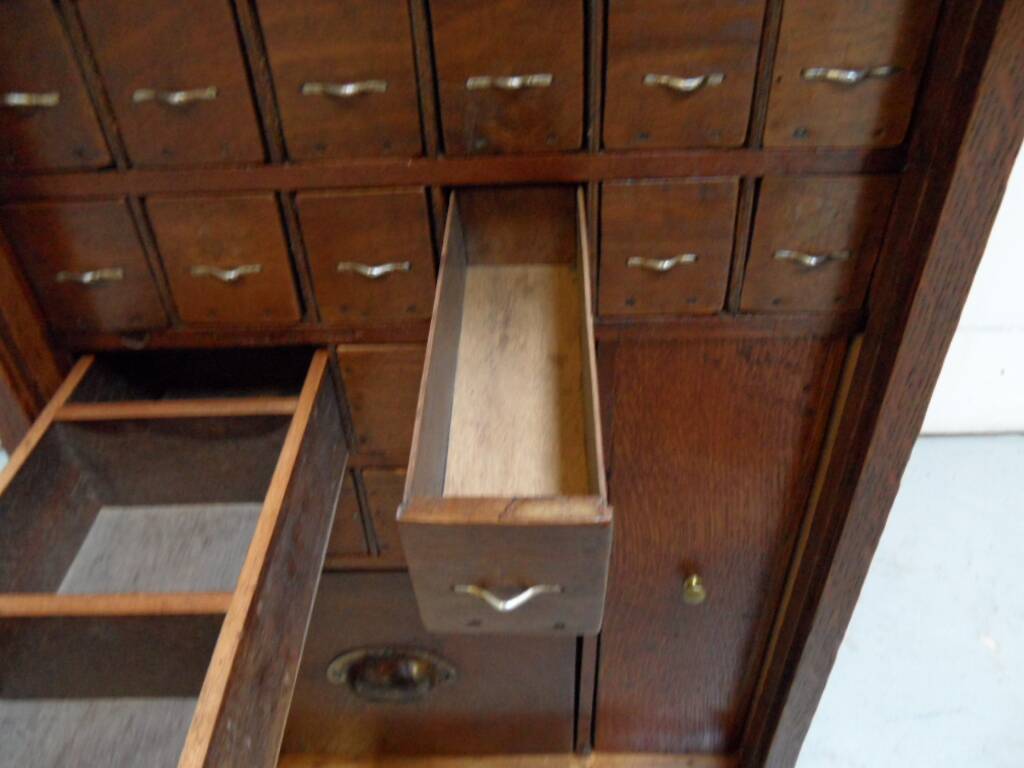 Antique watchmakers cabinet with drawers