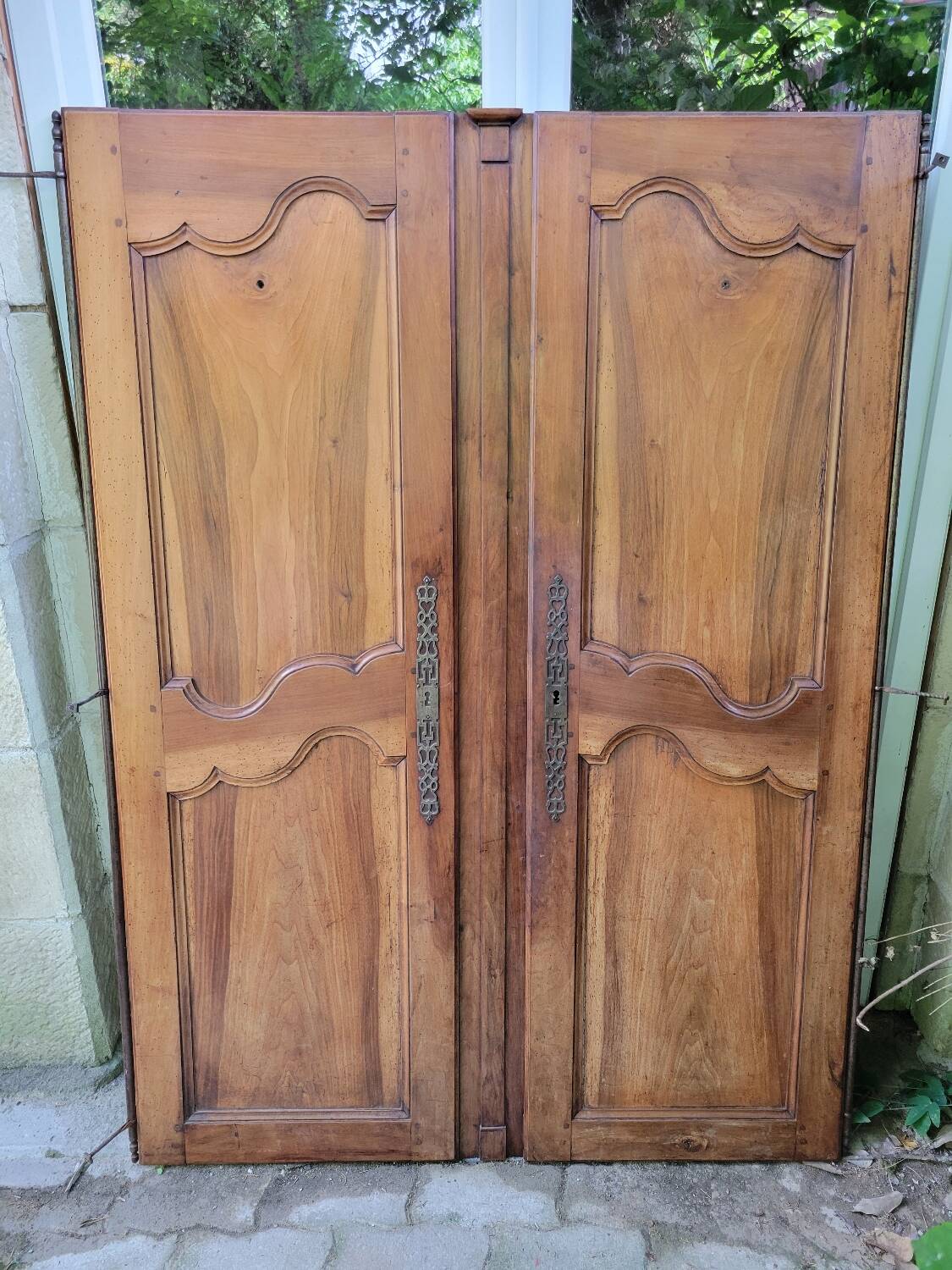 Double old wardrobe doors in walnut from around 1900.