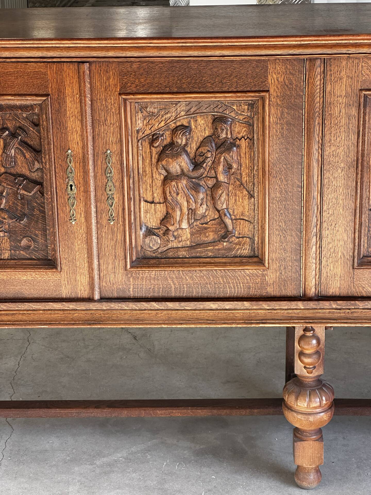 Large carved oak buffet in neo-Renaissance style, mid-20th century.