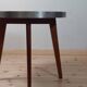 Vintage metal and teak side table from the 1950s.
