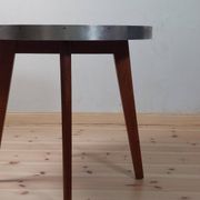 Vintage metal and teak side table from the 1950s.