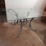 Glass top table with iron base in the style of wheat ears. Attributed to Robert Goossens.