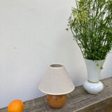 Wooden ball bedside lamp and beige lampshade