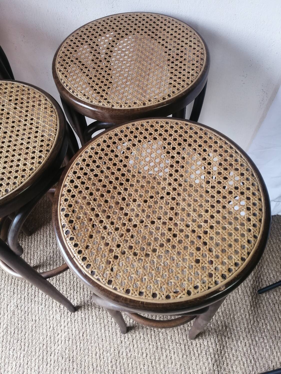 Set of 4 high bistro stools in curved wood and canework.