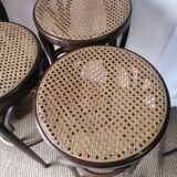 Set of 4 high bistro stools in curved wood and canework.