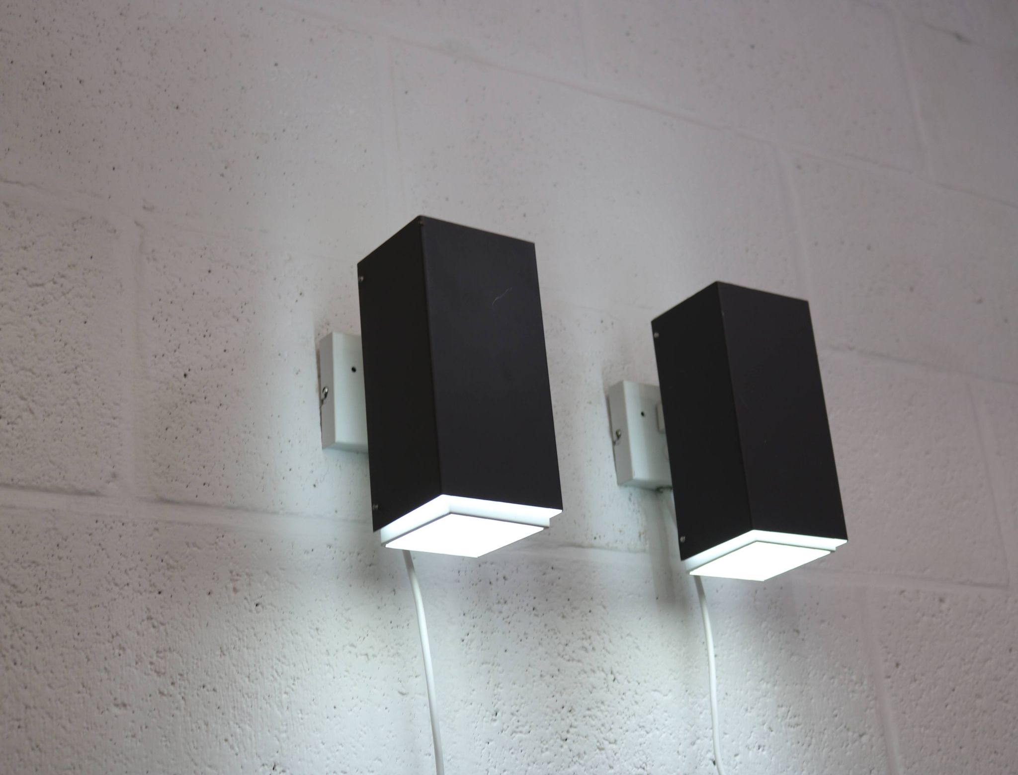 Pair of grey and white wall sconces by Preben Dahl for H. F. Belysning, 1960s