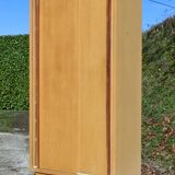 Small Scandinavian wardrobe with sliding doors - 1 side for hanging clothes.