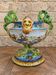 Coupe en faïence polychrome –décor de personnages et animaux fantastiques