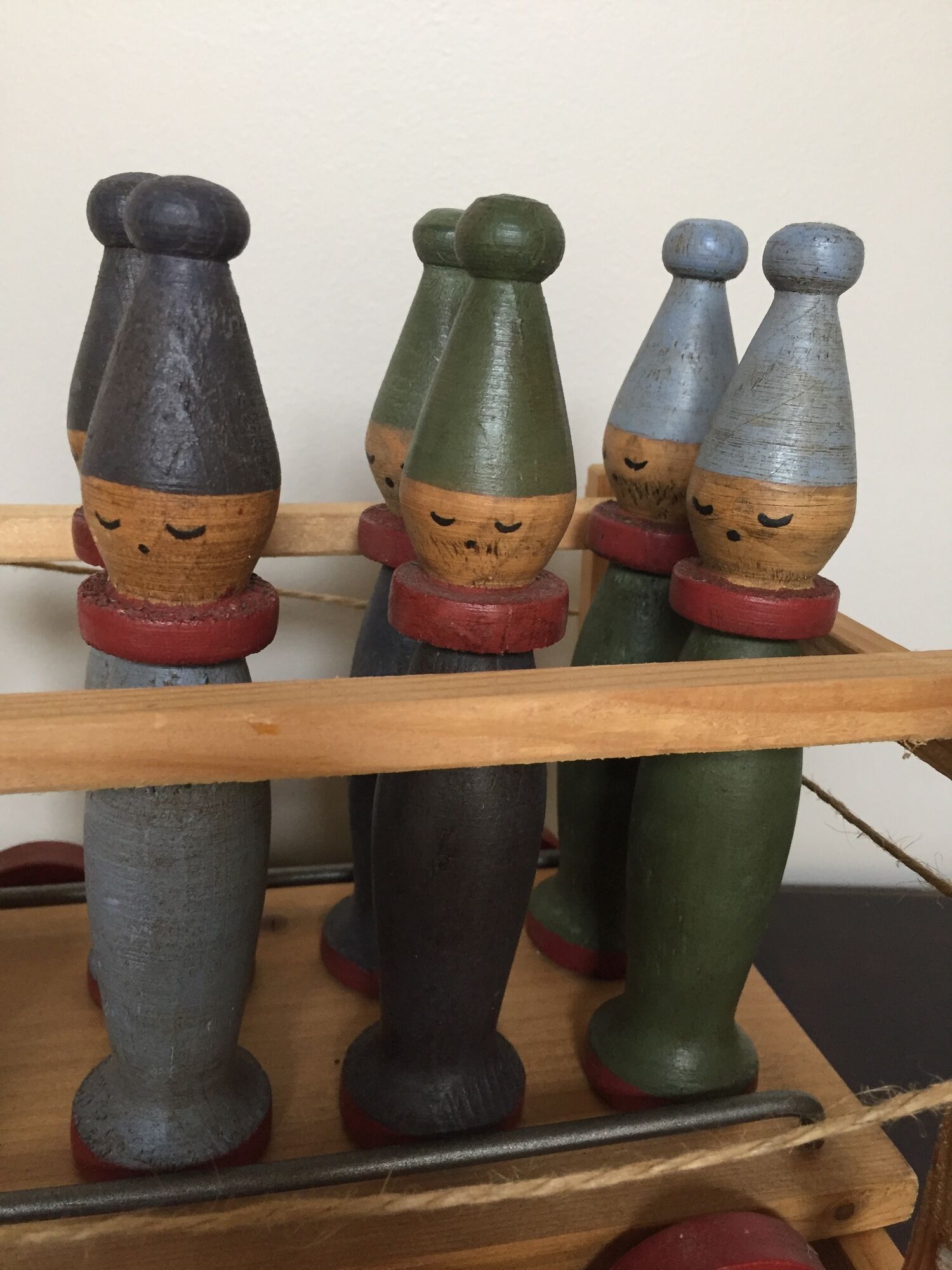 Set of Moulin Roty brand wooden bowling on roller cart, limited series.
