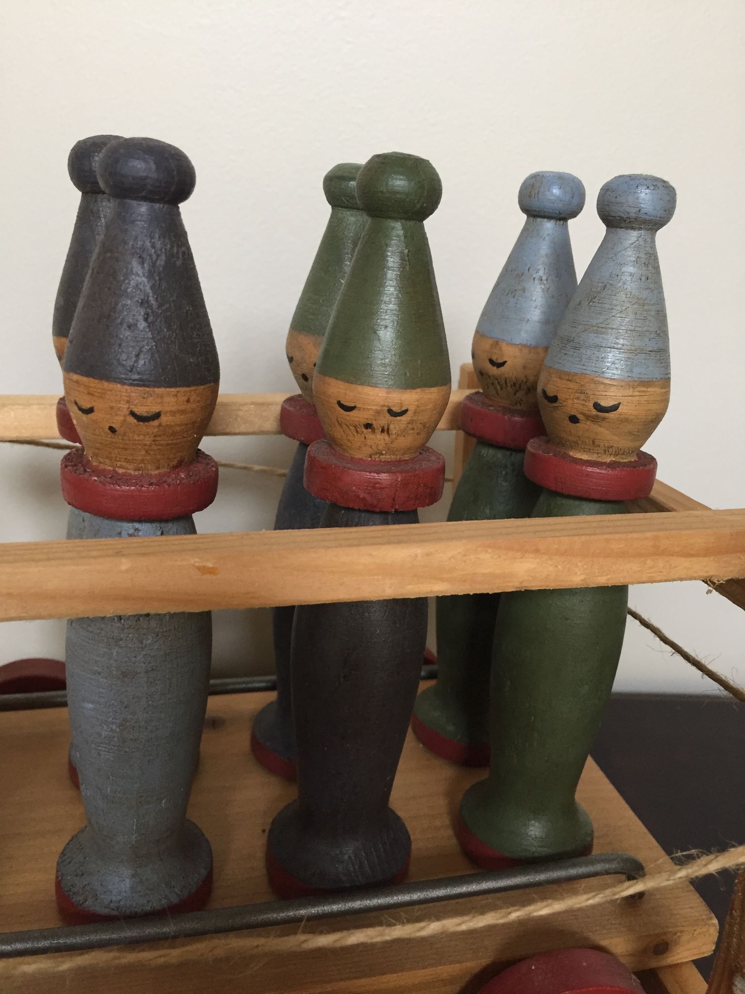 Set of Moulin Roty brand wooden bowling on roller cart, limited series.
