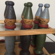 Set of Moulin Roty brand wooden bowling on roller cart, limited series.