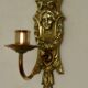 Pair of mid-century Swedish brass face motif sconces