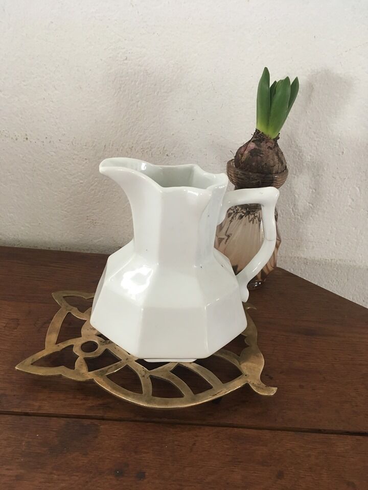 Under the nice brass dish.