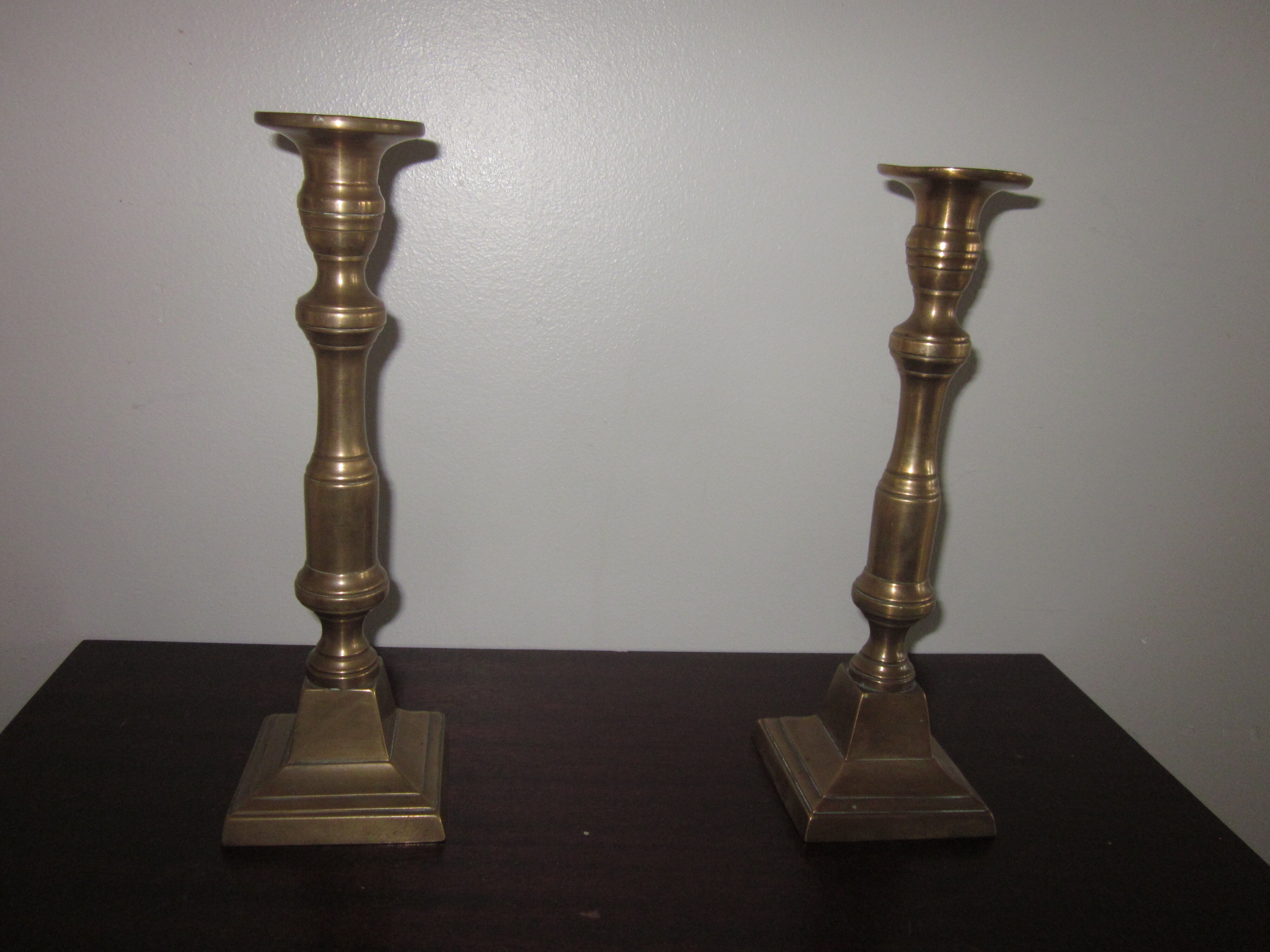 pair of old bronze candlesticks