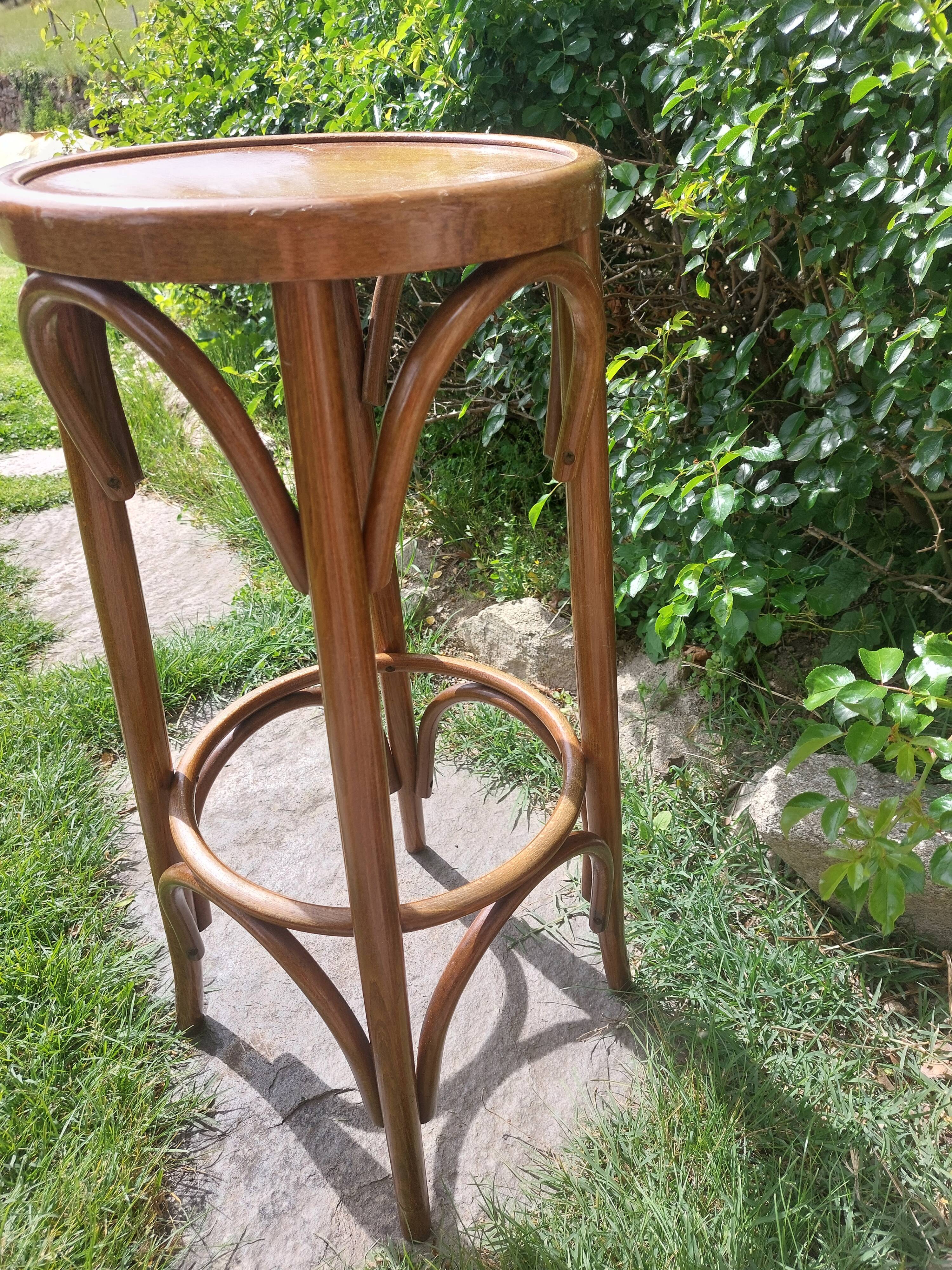 curved wooden bar stool