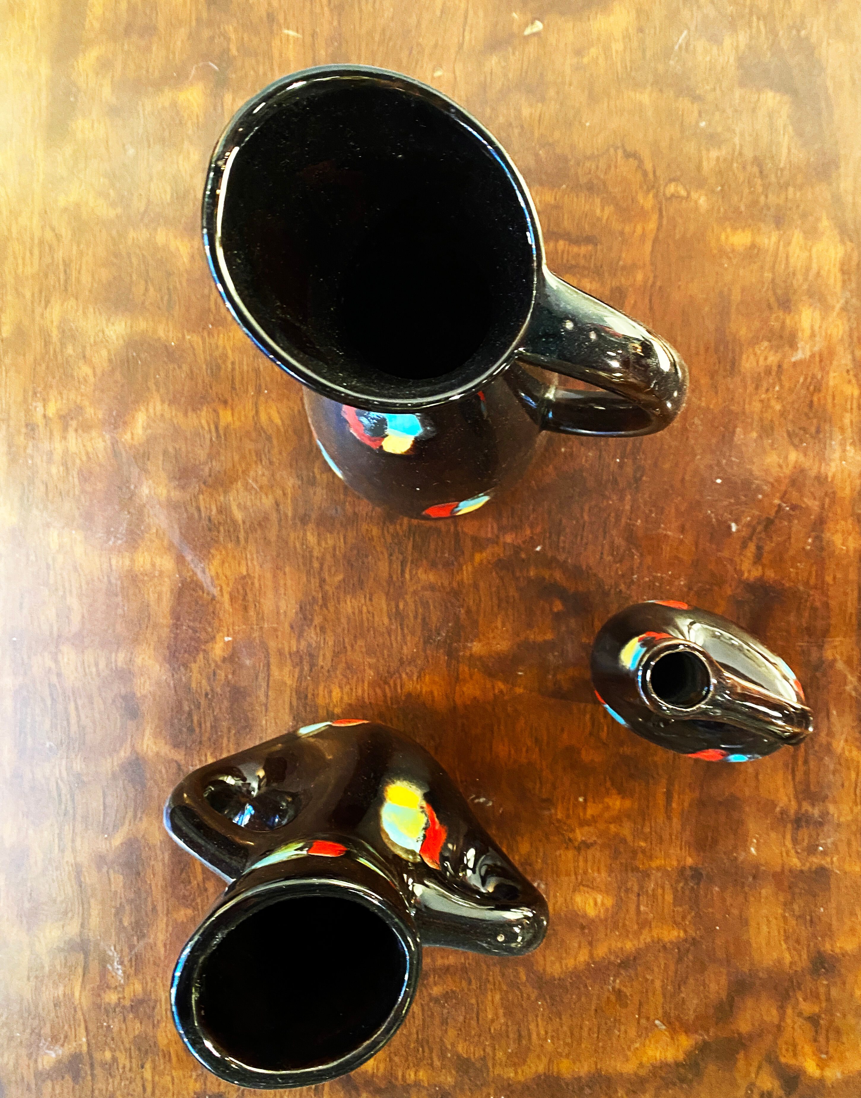 Set of three ceramic pitchers