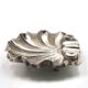 Art Deco ashtray in the shape of a shell in silver-plated metal.
