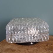 Square globe ceiling light in moulded glass.