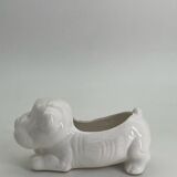Ceramic flower pot in the shape of a dog