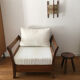 Fauteuil bois et tissu bouclette blanc crème