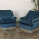 Pair of blue velvet armchairs with fringes