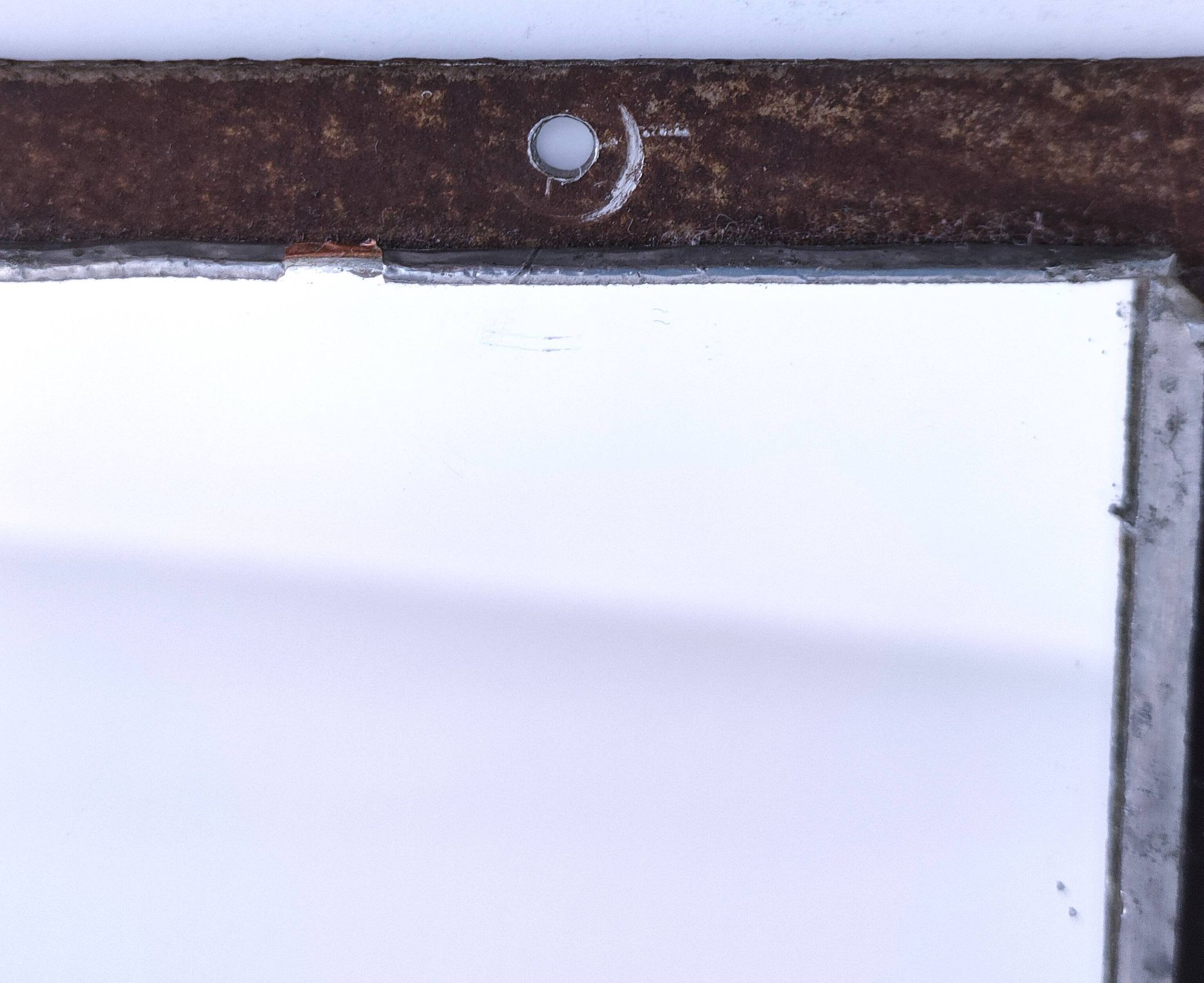Miroir brutaliste métal et verre serti